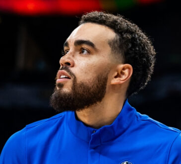 NBA: Tyus Jones shoots during pregame warmups for the Dallas Mavericks in San Antonio