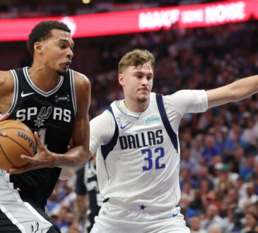 NBA: Victor Wembanyama drives to the basket for the San Antonio Spurs against Cooper Flagg of the Dallas Mavericks at American Airlines Center