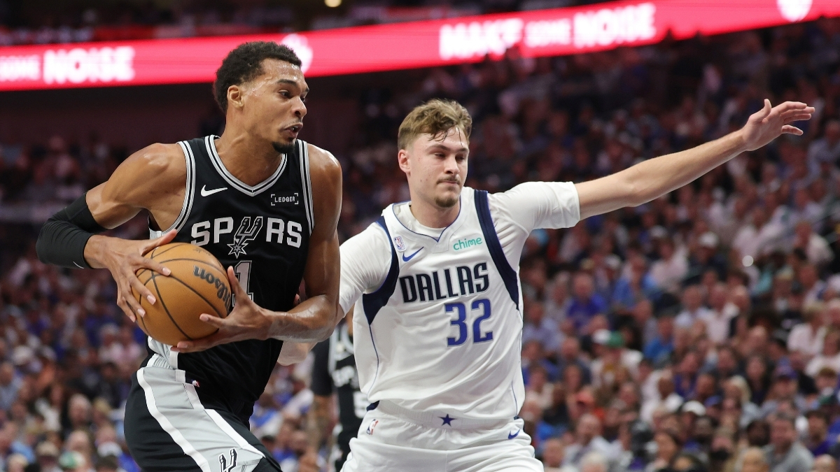 NBA: Victor Wembanyama drives to the basket for the San Antonio Spurs against Cooper Flagg of the Dallas Mavericks at American Airlines Center