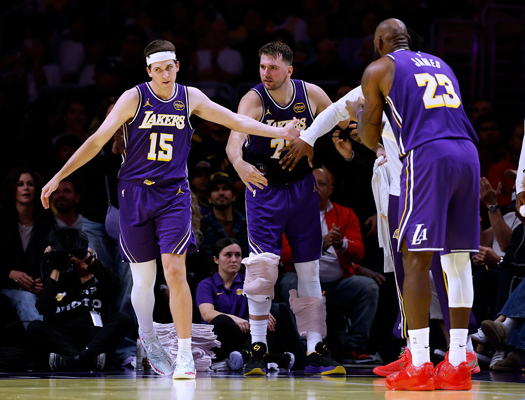 NBA players Luka Dončić, Austin Reaves and LeBron James of the Los Angeles Lakers