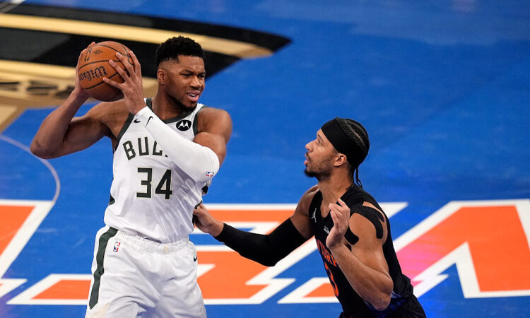 Josh Hart guards Giannis Antetokounmpo
