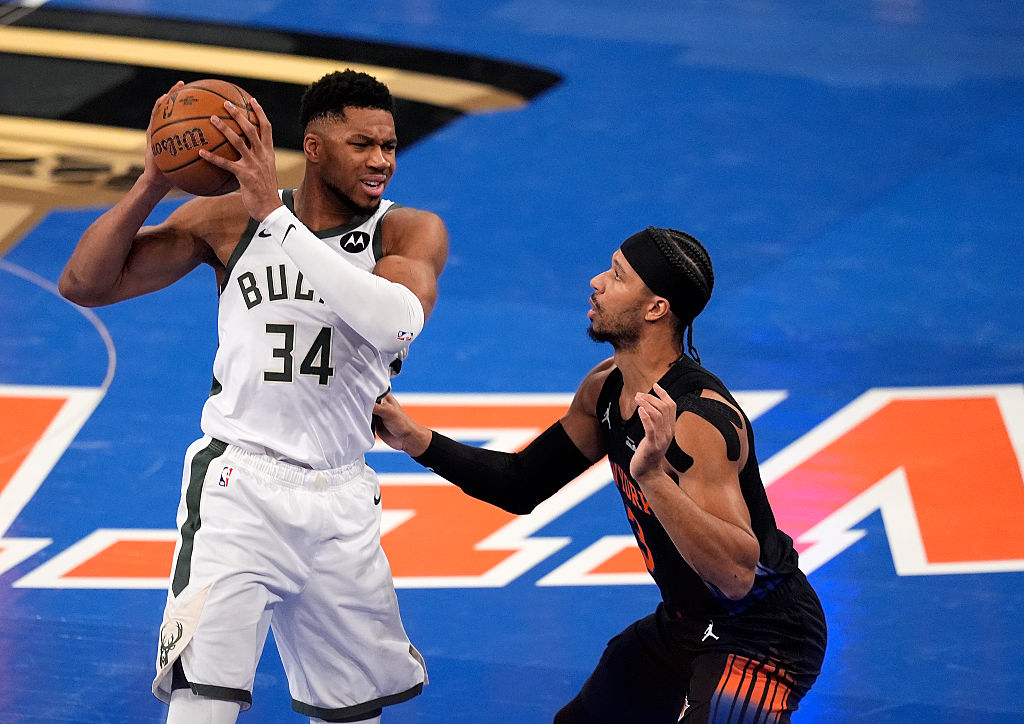 Josh Hart guards Giannis Antetokounmpo