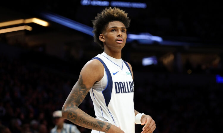NBA: AJ Johnson looks on during the second quarter at Target Center as the Dallas Mavericks face the Minnesota Timberwolves.