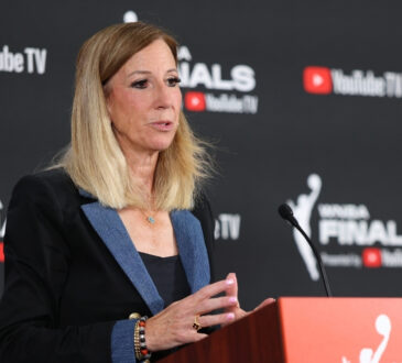 WNBA Commissioner Cathy Engelbert speaks at a podium ahead of Game 1 of the 2025 WNBA Finals in Las Vegas