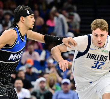 Cooper Flagg #32 of the Dallas Mavericks goes to the basket against Anthony Black #0 of the Orlando Magic at Kia Center on March 5, 2026 in Orlando, Florida.