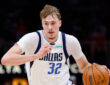 Cooper Flagg #32 of the Dallas Mavericks drives to the basket during the first quarter against the Atlanta Hawks at State Farm Arena on March 10, 2026 in Atlanta, Georgia.