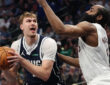 Cooper Flagg #32 of the Dallas Mavericks is defended by James Harden #1 of the Cleveland Cavaliers during the first half at American Airlines Center on March 13, 2026 in Dallas, Texas.