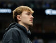 NBA: Cooper Flagg sits on the bench during a timeout at American Airlines Center against the Sacramento Kings