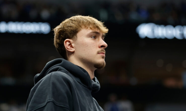 NBA: Cooper Flagg sits on the bench during a timeout at American Airlines Center against the Sacramento Kings