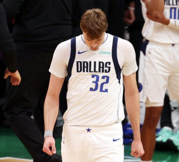 Cooper Flagg exits the huddle during a first-quarter timeout against the Boston Celtics at TD Garden on March 6, 2026
