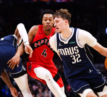 Cooper Flagg #32 of the Dallas Mavericks drives to the basket against Scottie Barnes #4 of the Toronto Raptors at Scotiabank Arena on March 8, 2026.