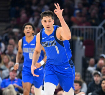 John Poulakidas #1 of the Dallas Mavericks celebrates during the third quarter against the Cleveland Cavaliers at Rocket Arena on March 15, 2026 in Cleveland, Ohio