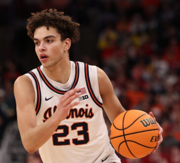 Keaton Wagler of Illinois dribbles in the second half against Wisconsin during the 2026 Big Ten Tournament quarterfinal at United Center.