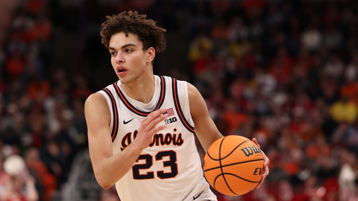 Keaton Wagler of Illinois dribbles in the second half against Wisconsin during the 2026 Big Ten Tournament quarterfinal at United Center.