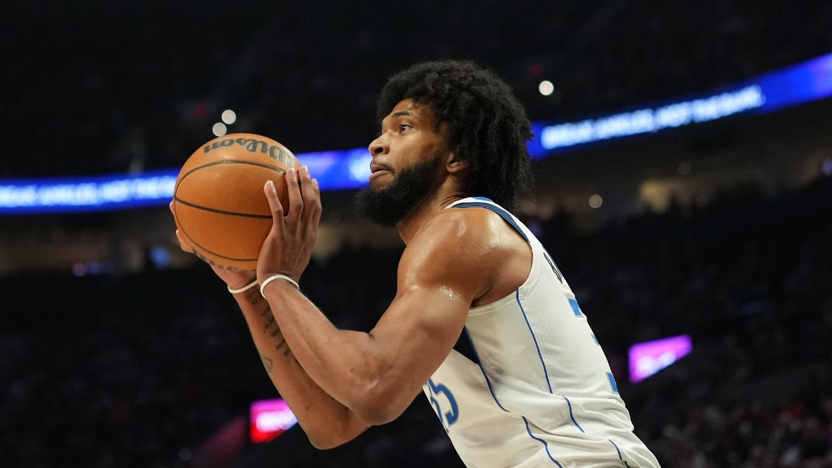 Marvin Bagley III #35 of the Dallas Mavericks prepares to shoot a jumper against the Portland Trail Blazers at Moda Center.