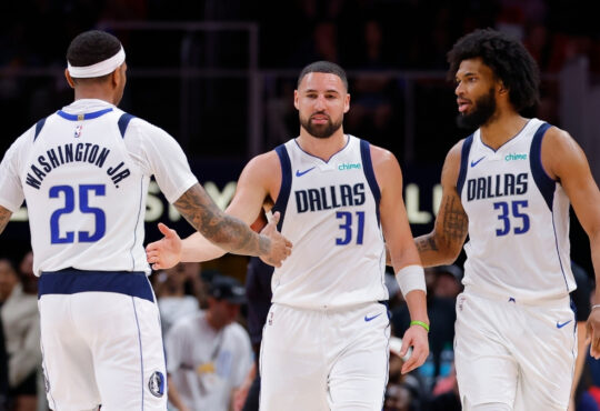 P.J. Washington, Klay Thompson and Marvin Bagley III react during the Mavericks’ game against the Hawks at State Farm Arena on March 10, 2026.