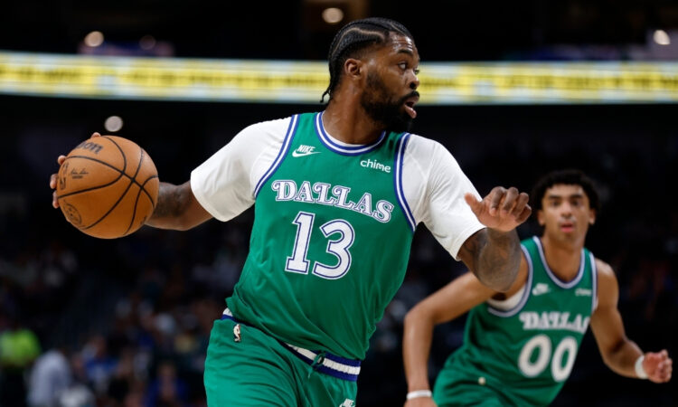 Naji Marshall of the Dallas Mavericks handles the ball against the Los Angeles Clippers during the first half at American Airlines Center on March 21, 2026.