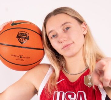 Paige Bueckers holds a basketball while posing in her USA Basketball uniform ahead of the 2026 FIBA Women's World Cup Qualifying Tournament in Puerto Rico.
