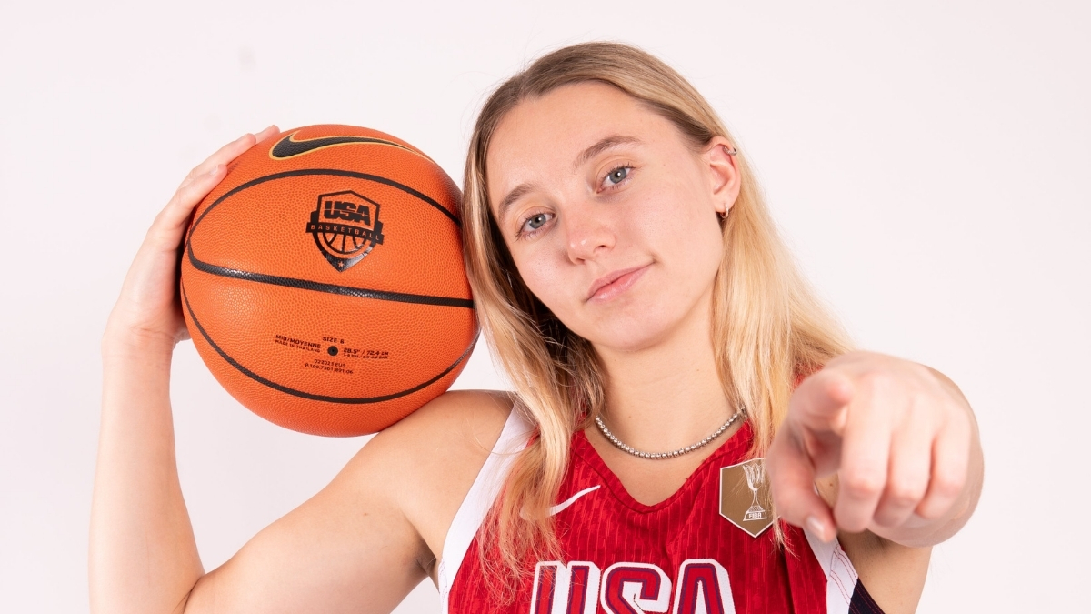 Paige Bueckers holds a basketball while posing in her USA Basketball uniform ahead of the 2026 FIBA Women's World Cup Qualifying Tournament in Puerto Rico.