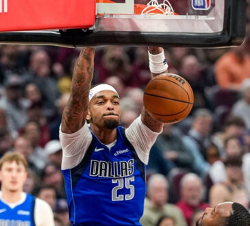 P.J. Washington #25 of the Dallas Mavericks dunks during the first half against the Cleveland Cavaliers at Rocket Arena on March 15, 2026 in Cleveland, Ohio.