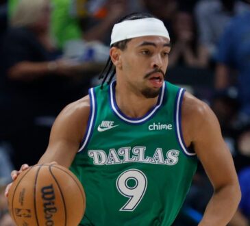 Ryan Nembhard handles the ball for the Dallas Mavericks against the Los Angeles Clippers on March 21, 2026, at American Airlines Center.