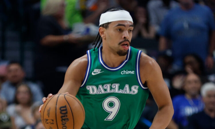 Ryan Nembhard handles the ball for the Dallas Mavericks against the Los Angeles Clippers on March 21, 2026, at American Airlines Center.