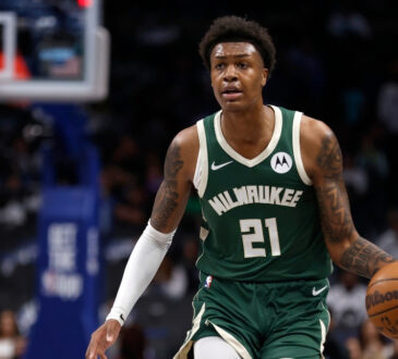 NBA: Tyler Smith handles the ball for the Milwaukee Bucks during a preseason game against the Dallas Mavericks at American Airlines Center.