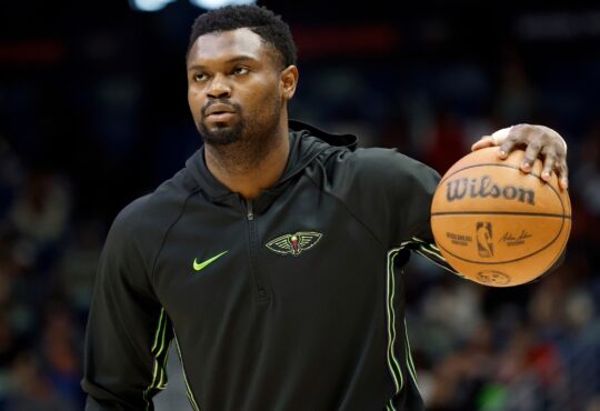 Zion Williamson of the New Orleans Pelicans warms up at Smoothie King Center before a game against the Houston Rockets.