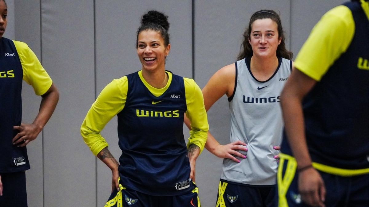 Dallas Wings forwards Alysha Clark and Maddy Siegrist stand together during a 2026 training camp practice at College Park Center.