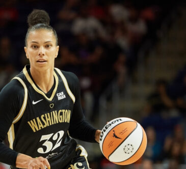 Alysha Clark #32 of the Washington Mystics dribbles against the Golden State Valkyries during a game in Washington, DC.