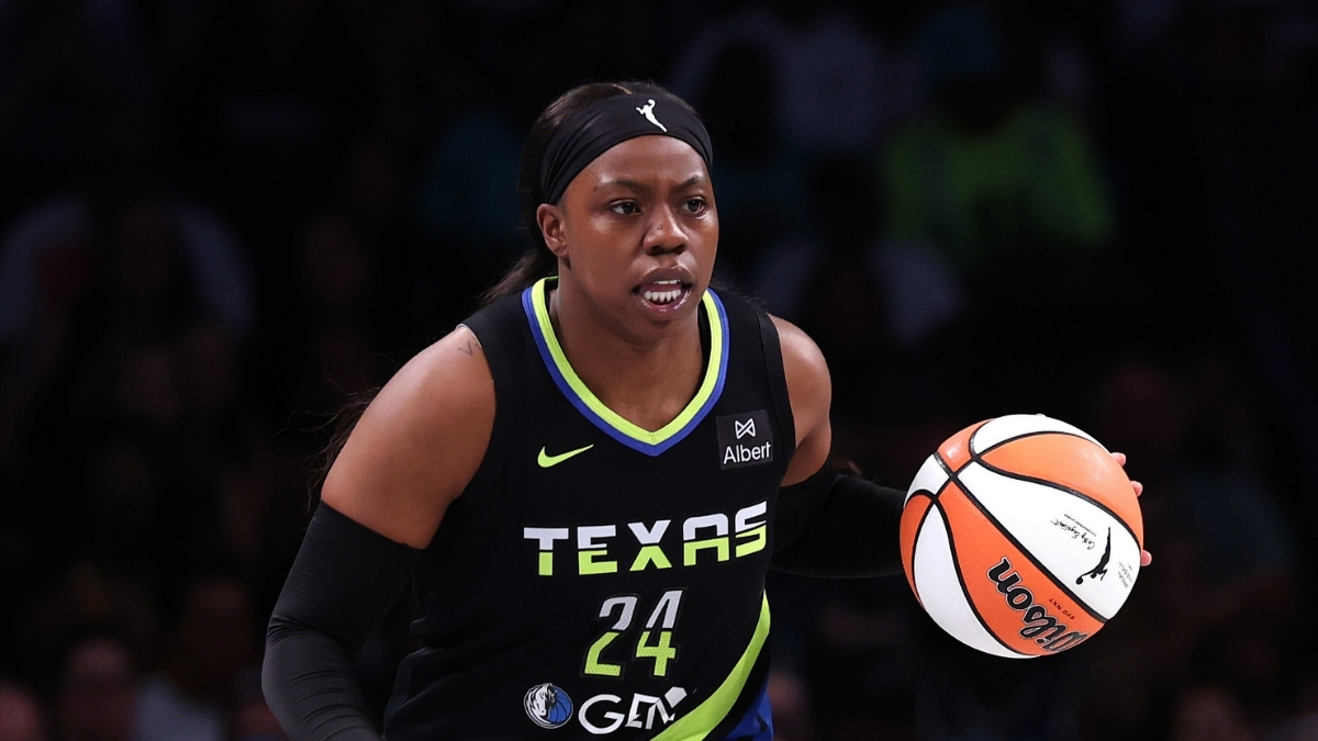 Arike Ogunbowale #24 of the Dallas Wings handles the ball during the first half against the New York Liberty at Barclays Center.