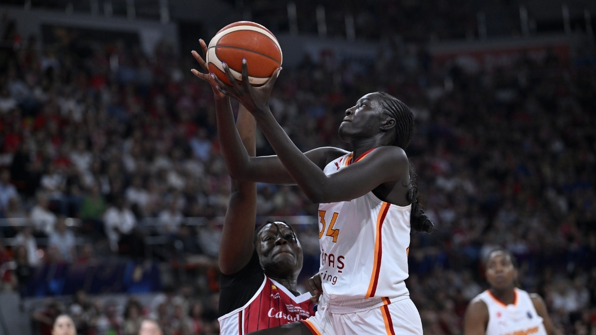 Dallas Wings forward Awak Kuier battling for position against Aminata Gueye of Casademont Zaragoza during the EuroLeague Women Final Six in Spain.