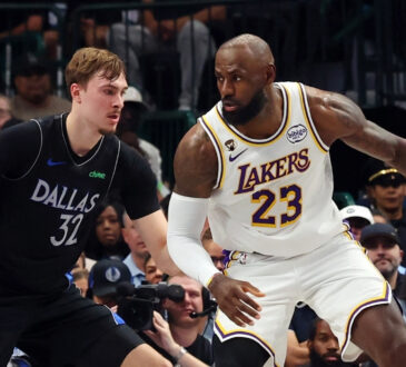 Cooper Flagg #32 of the Dallas Mavericks plays tight defense on LeBron James #23 of the Los Angeles Lakers during their April 5, 2026, game at American Airlines Center.