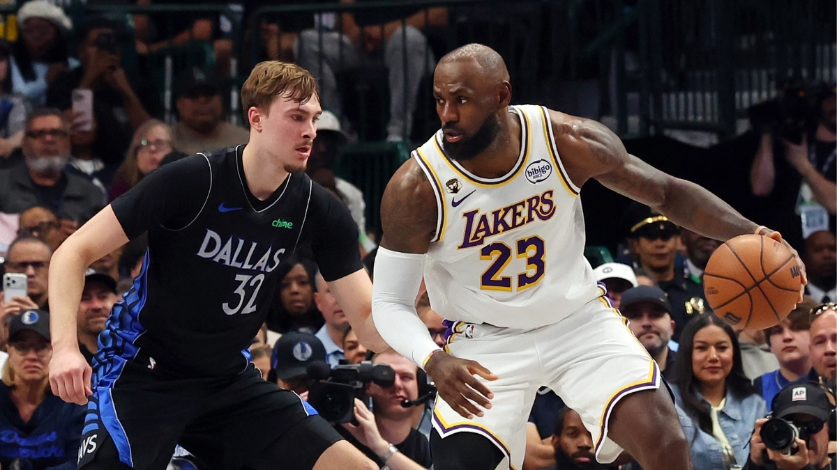 Cooper Flagg #32 of the Dallas Mavericks plays tight defense on LeBron James #23 of the Los Angeles Lakers during their April 5, 2026, game at American Airlines Center.