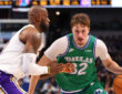 Cooper Flagg #32 of the Dallas Mavericks is defended by LeBron James #23 of the Los Angeles Lakers during the second half at American Airlines Center on January 24, 2026 in Dallas, Texas.