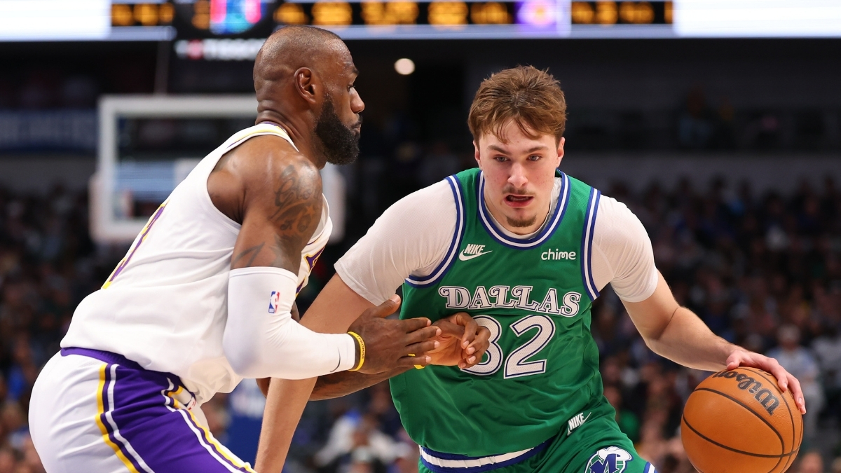 Cooper Flagg #32 of the Dallas Mavericks is defended by LeBron James #23 of the Los Angeles Lakers during the second half at American Airlines Center on January 24, 2026 in Dallas, Texas.