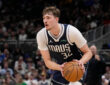 Cooper Flagg #32 of the Dallas Mavericks brings the ball up the court against the Milwaukee Bucks during the fourth quarter at Fiserv Forum on March 31, 2026.