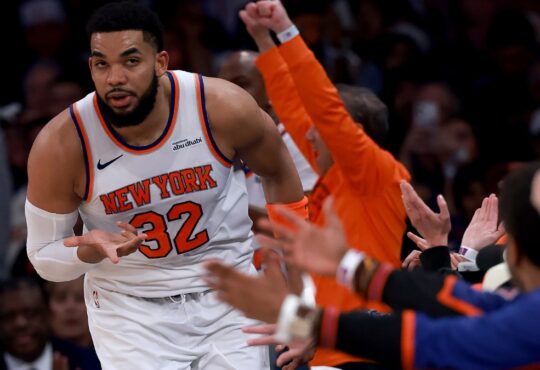 Karl-Anthony Towns #32 of the New York Knicks celebrates a three-pointer against the Atlanta Hawks in Game 1 of the Eastern Conference First Round at Madison Square Garden on April 18, 2026.