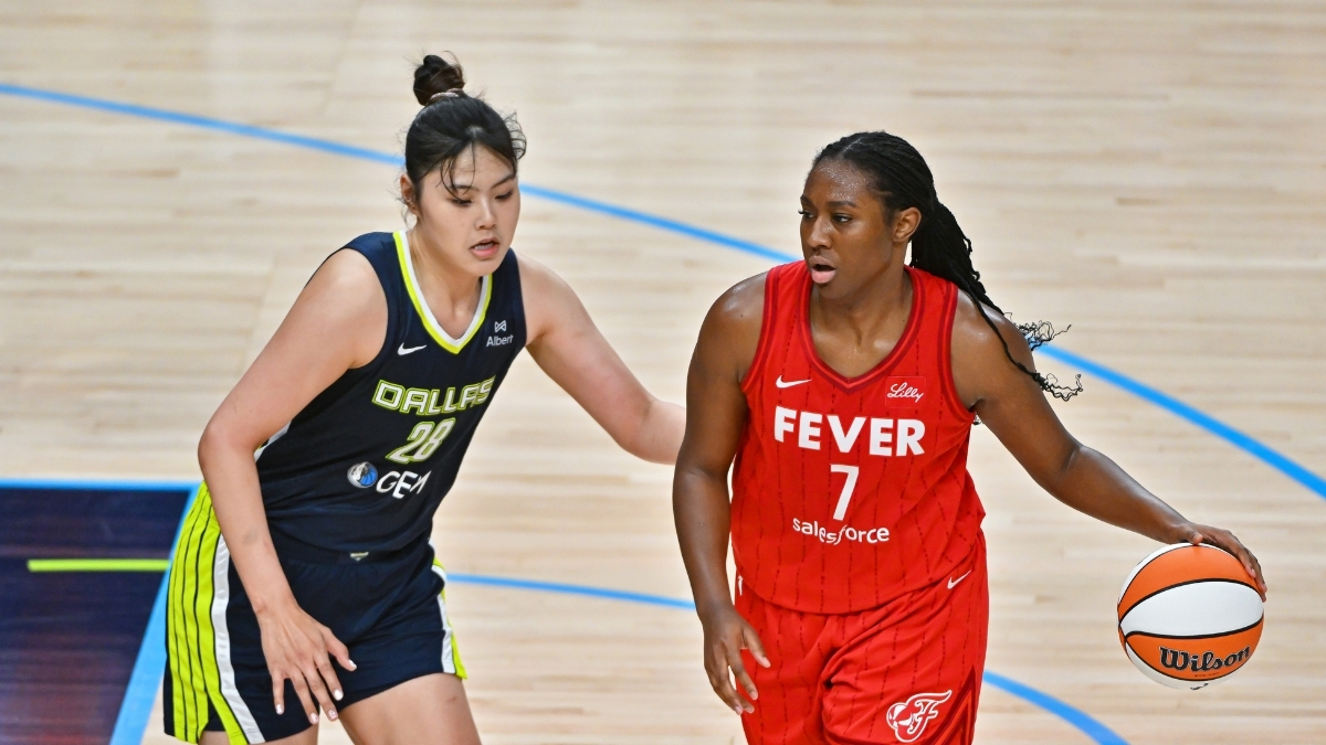 Dallas Wings center Li Yueru defends Indiana Fever center Aliyah Boston in the post during a game at American Airlines Center.