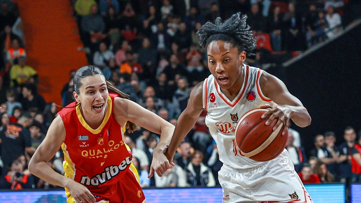 Lindsey Allen of CBK Mersin competes for the ball against Pinelopi Pavlopoulou during the EuroCup Women final in Turkiye.