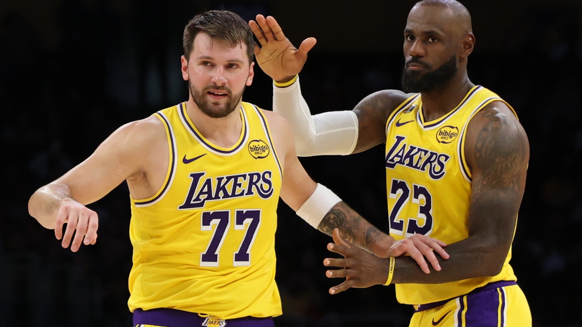 LeBron James congratulating Luka Dončić after his 51-point performance and record-breaking three-pointer during the Lakers vs. Bulls game at Crypto.com Arena.