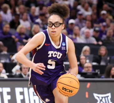 Olivia Miles #5 of the TCU Horned Frogs dribbles up the court during the Elite Eight round of the 2026 NCAA Women's Basketball Tournament in Sacramento.
