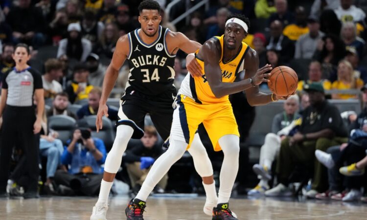 Pascal Siakam #43 of the Indiana Pacers is guarded by Giannis Antetokounmpo #34 of the Milwaukee Bucks at Gainbridge Fieldhouse on November 03, 2025.