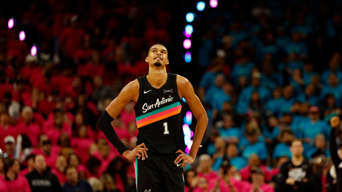 Victor Wembanyama #1 of the San Antonio Spurs looks at the clock during Game 1 of the Western Conference First Round against the Portland Trail Blazers at Frost Bank Center on April 19, 2026.