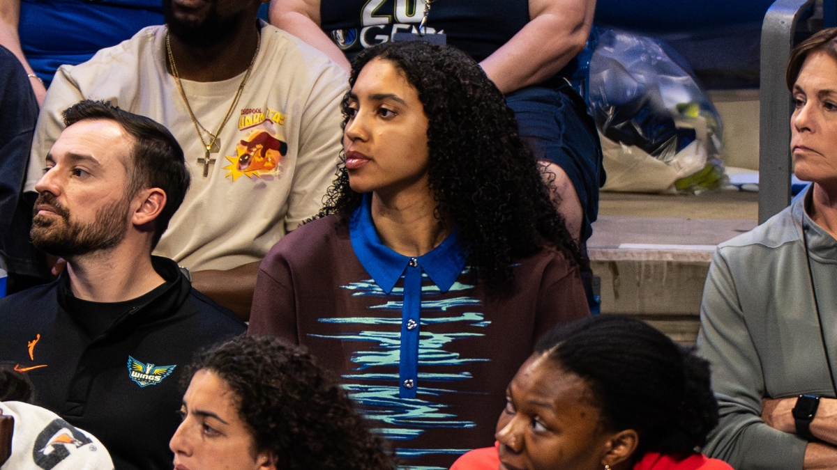 Dallas Wings rookie Azzi Fudd watching from the bench during the 2026 home opener against the Atlanta Dream.
