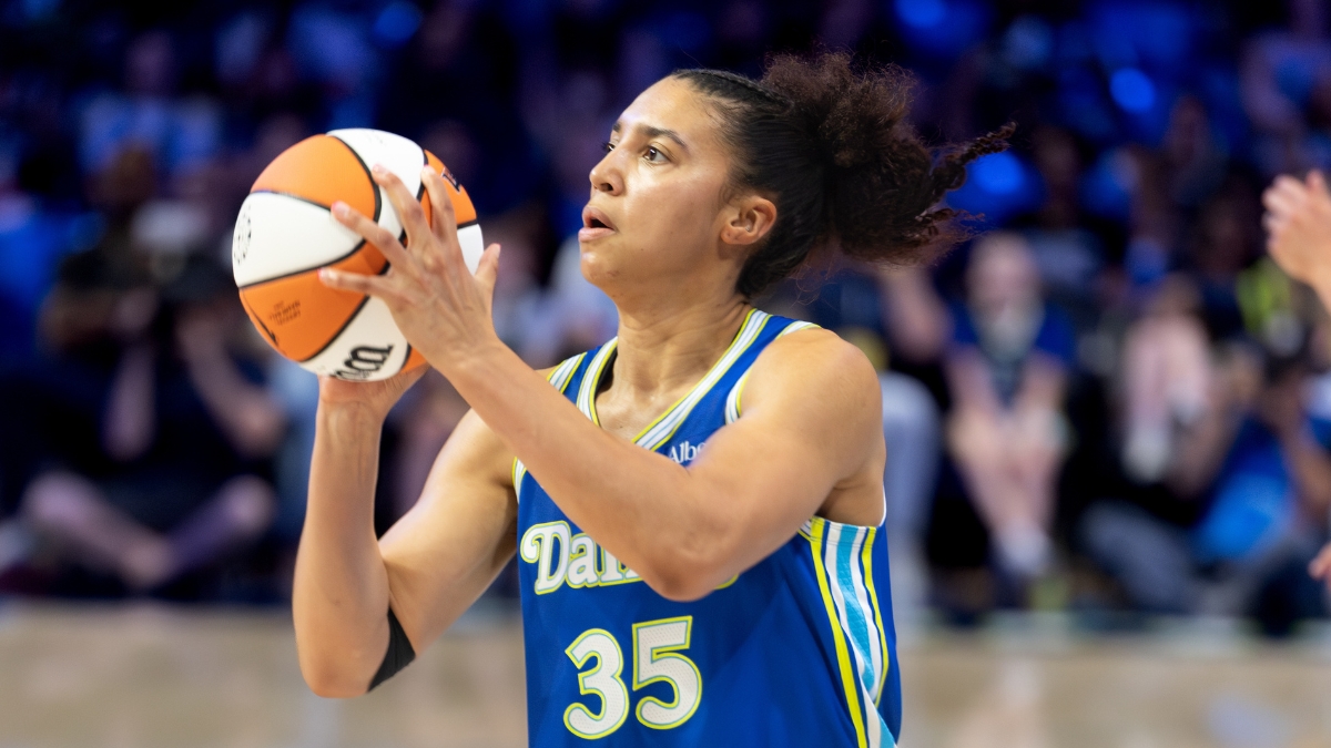 Rookie guard Azzi Fudd of the Dallas Wings rising for a mid-range pull-up jump shot against the Washington Mystics at College Park Center.
