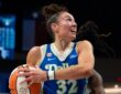 Center Jessica Shepard lowering her shoulder to drive hard down the lane, exploding past her defender toward the rim.