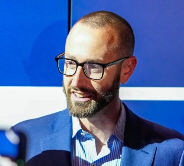 Dallas Mavericks general manager Mike Schmitz speaking to reporters at the 2026 NBA Draft Lottery in Chicago