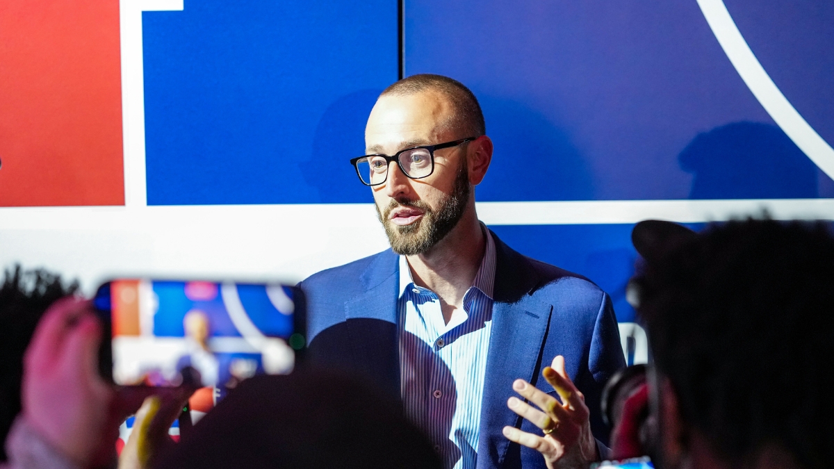 New Dallas Mavericks General Manager Mike Schmitz speaking to reporters after the 2026 NBA Draft Lottery in Chicago.