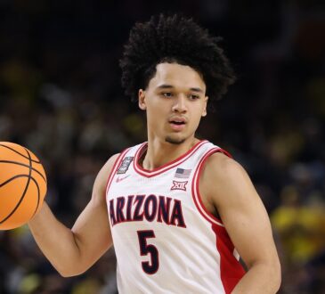 Arizona Wildcats guard Brayden Burries dribbles up the court against Michigan in the 2026 NCAA Final Four.